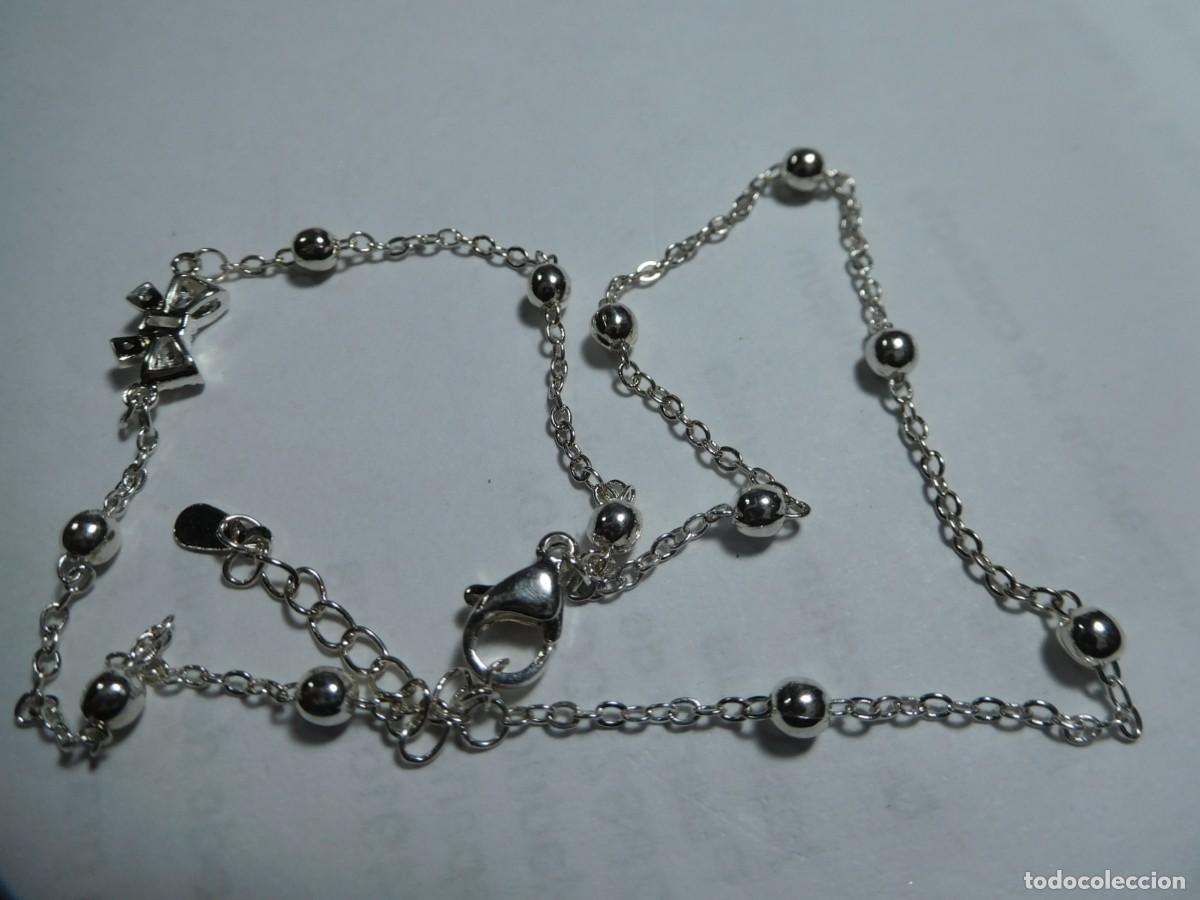 Joyeria: collar de acero inoxidable, destellante, elegante
