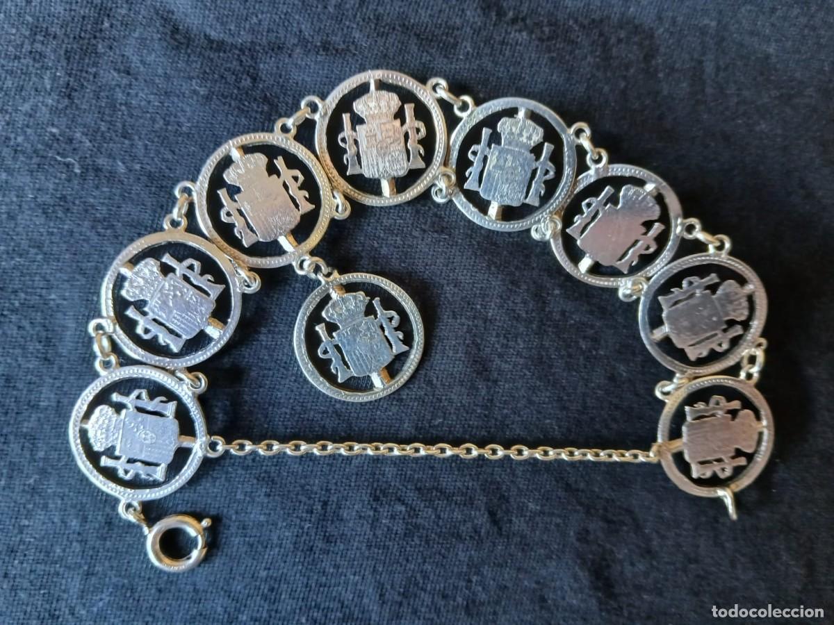 Joyeria: Pulsera Alfonsina de Plata con 9 Monedas caladas de 1 peseta.