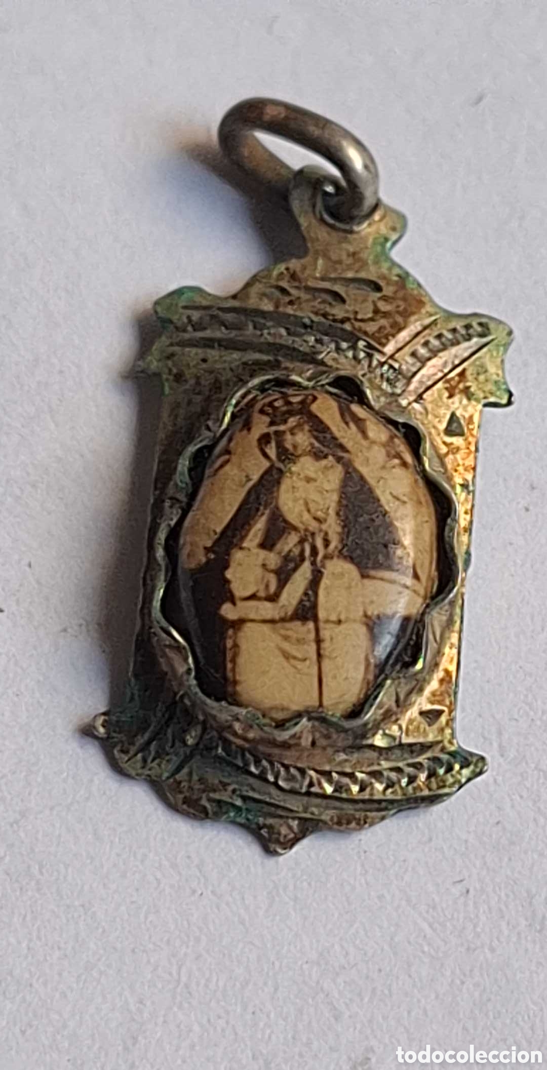 Joyeria: Colgante con imagen de una virgen