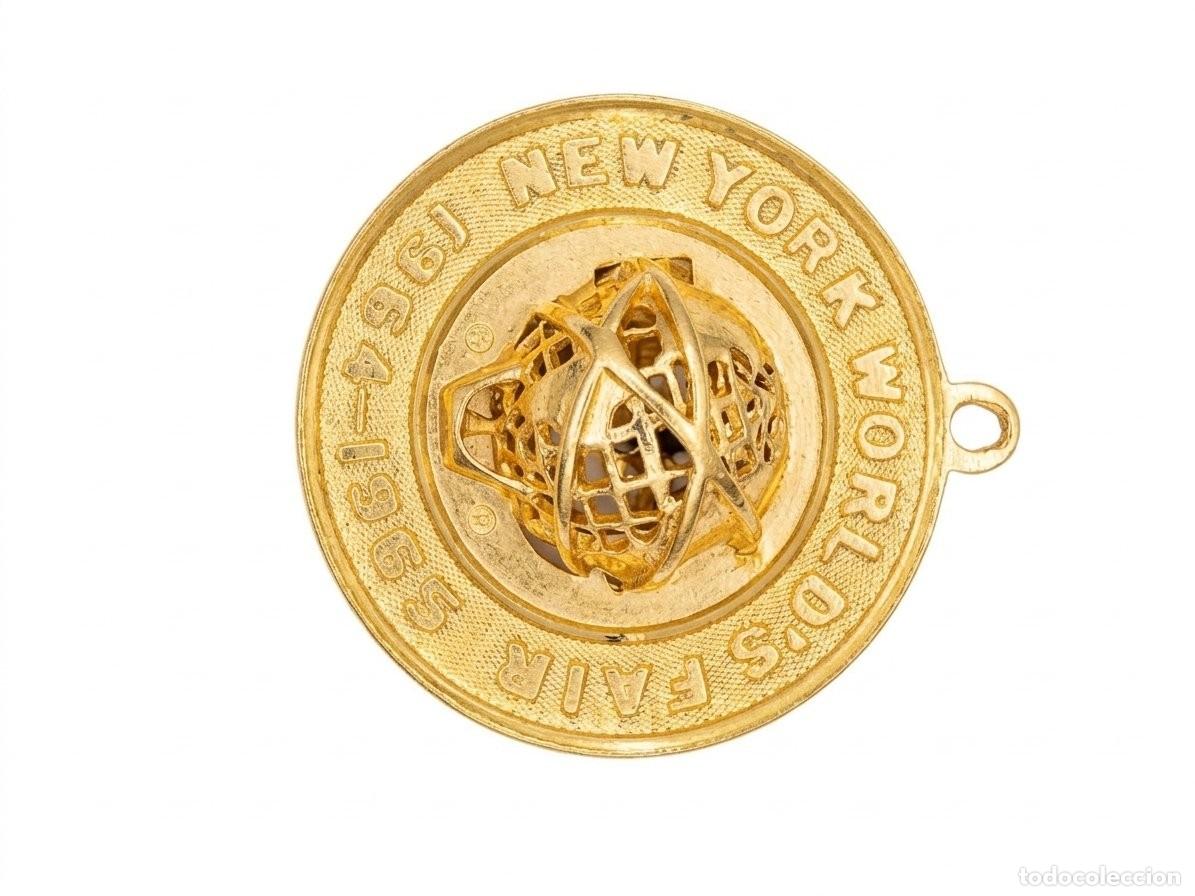 Joyeria: Colgante con Luz Feria Mundial de Nueva York 1964-1965 Oro 14K - NYWF Funcional