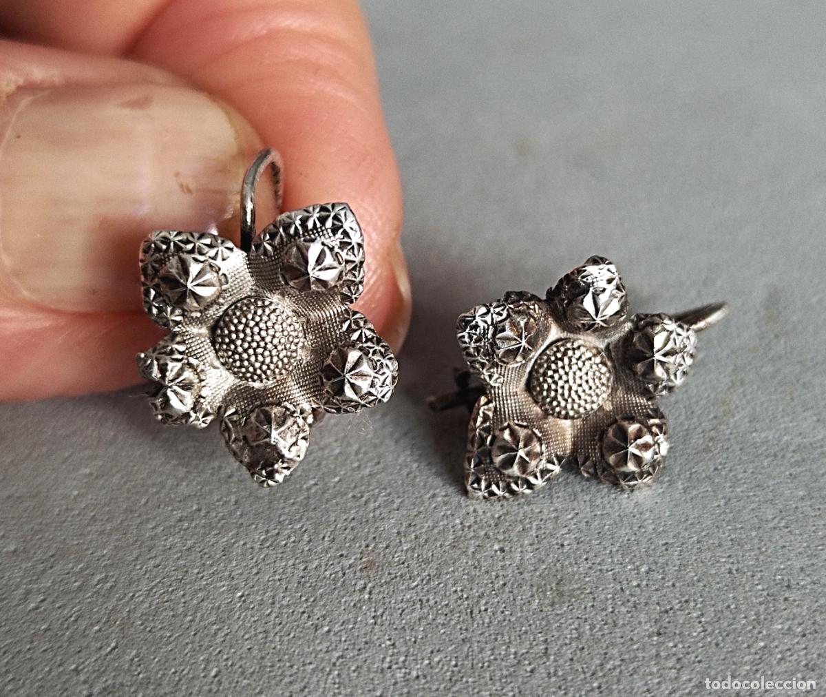 Joalharia: Pendientes de plata, forma flor.