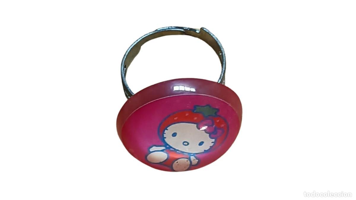Joyeria: ANILLO AJUSTABLE SANRIO HELLO KITTY DISFRAZADA DE FRESA - C&Uacute;PULA ROSA TRANSL&Uacute;CIDA - PIEZA DE COLECCI