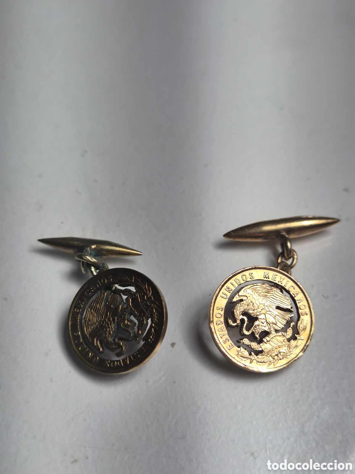 Joyeria: Gemelos moneda mejicana plata con ba&ntilde;o de oro