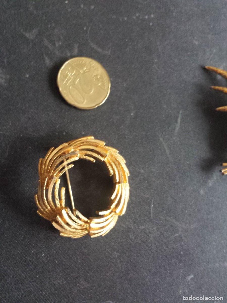 Joyeria: Broche de palmas en c&iacute;rculo dorado
