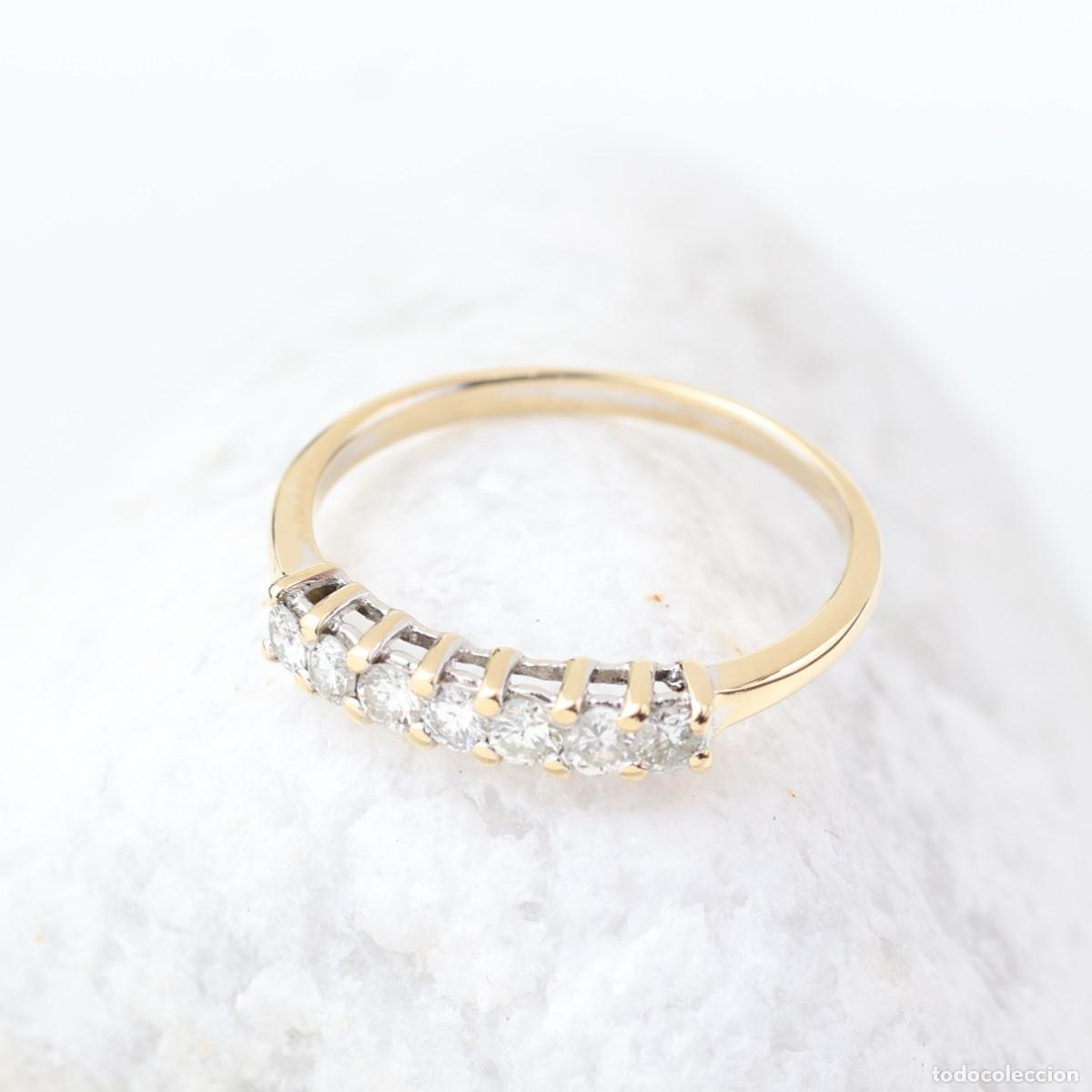 Joyeria: Anillo media alianza de 7 diamantes en oro amarillo de 18K &ndash; 0,35 ct