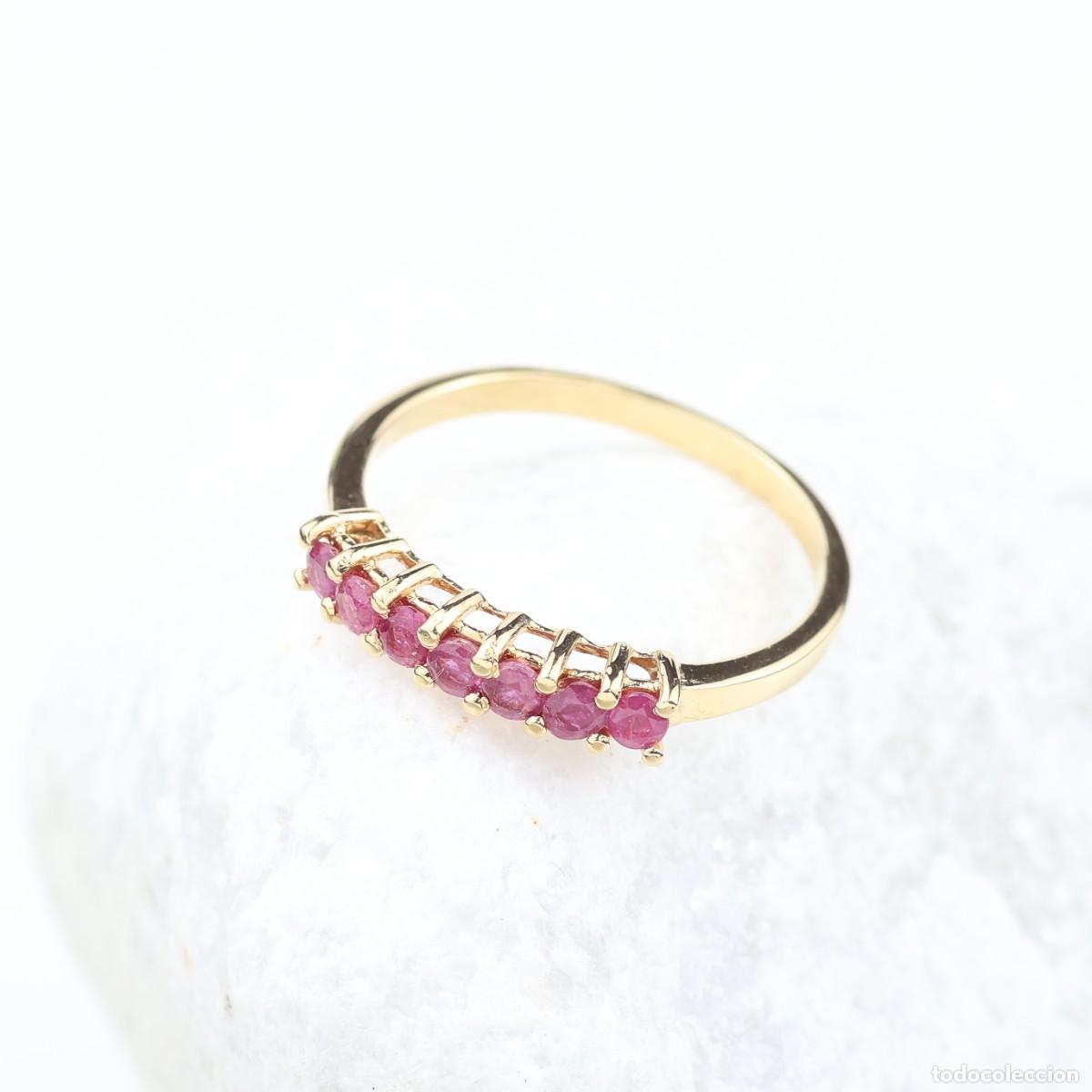 Joyeria: Anillo media alianza de 7 rub&iacute;es en oro amarillo de 18K &ndash; 0,56 ct