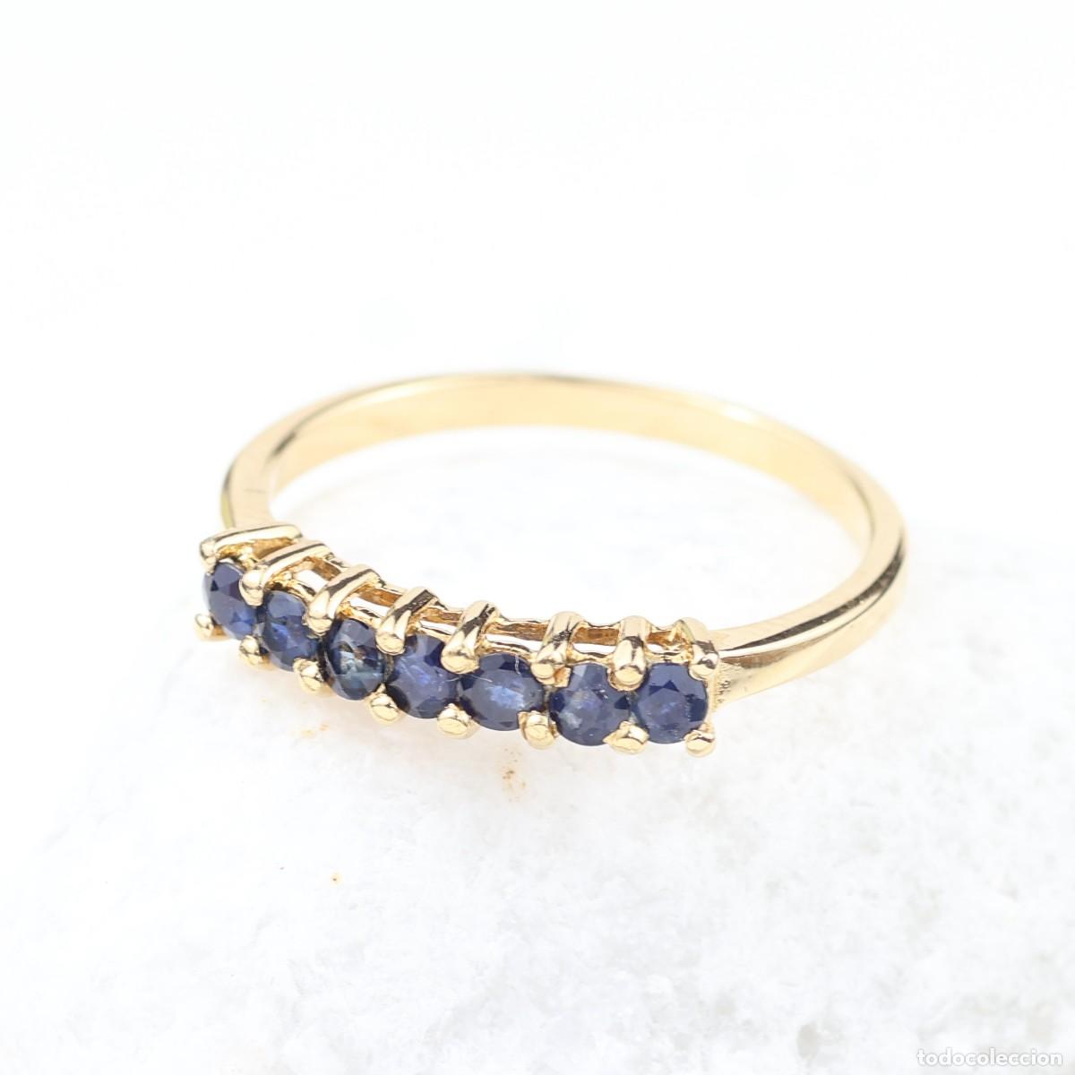 Joyeria: Anillo media alianza de 7 zafiros azules en oro amarillo de 18K &ndash; 0,56 ct
