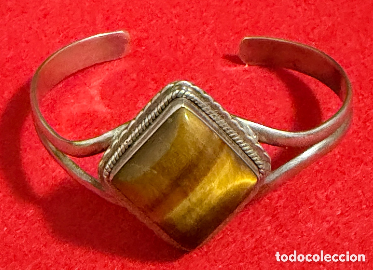 Joyeria: Preciosa pulsera-brazalete en plata de ley contrastada, y ojo de tigre
