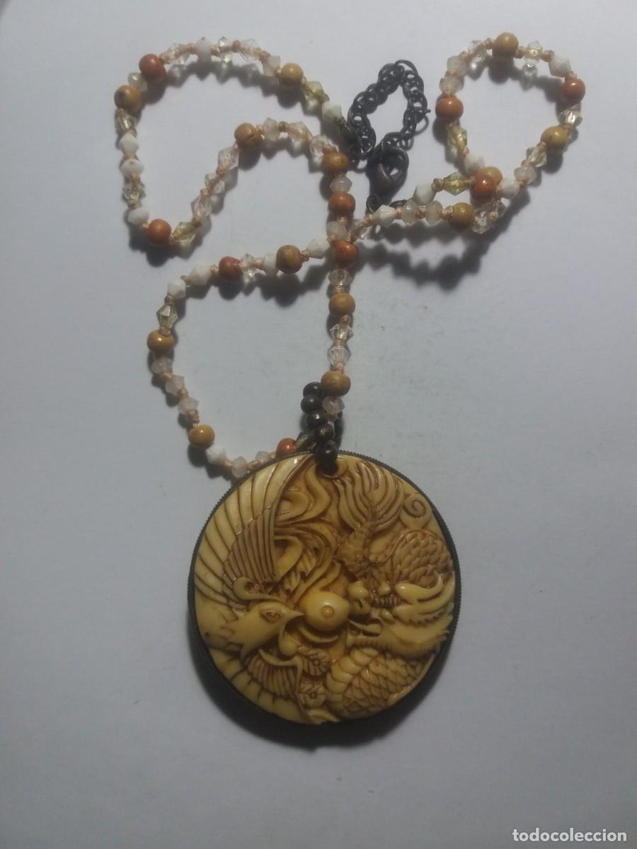 Joyeria: Colgante amuleto de la suerte decorativo art&iacute;stico.