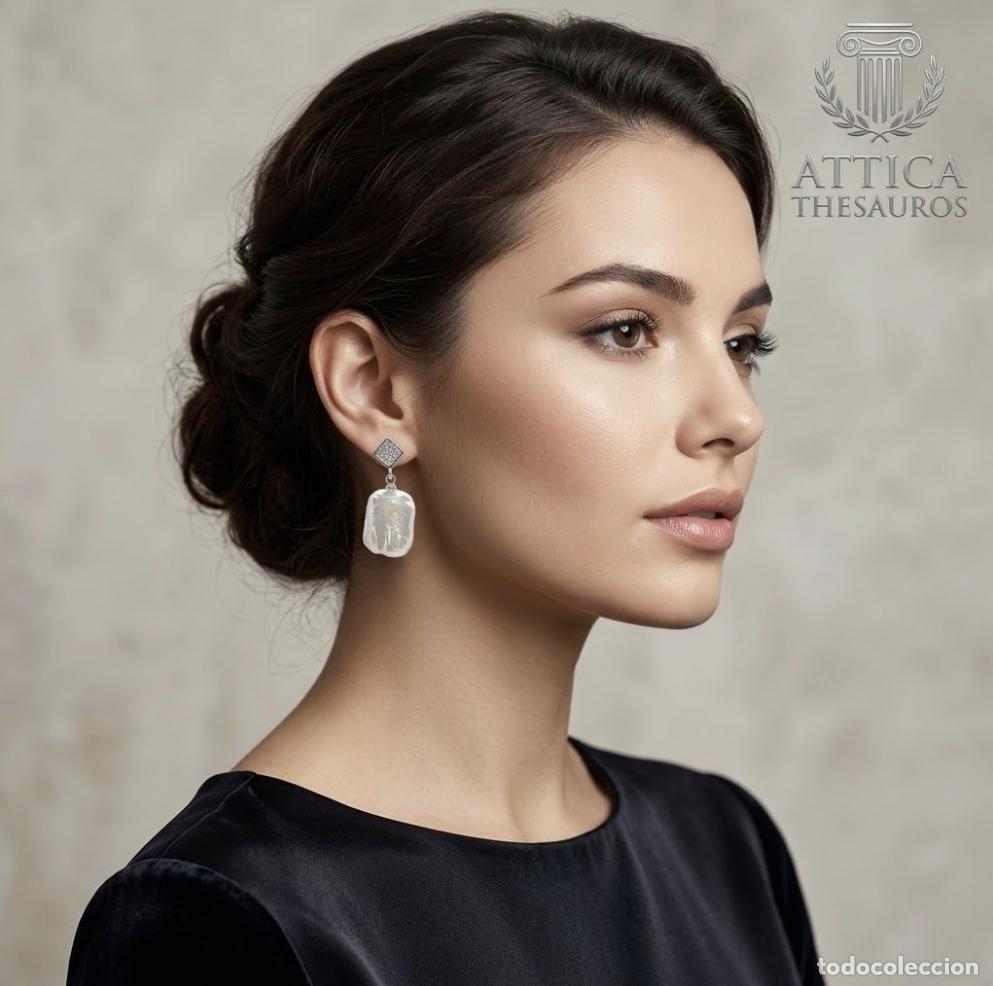 Joyeria: Exquisitos pendientes de lujo chapados en oro blanco, circonitas y magn&iacute;ficas perlas barrocas.