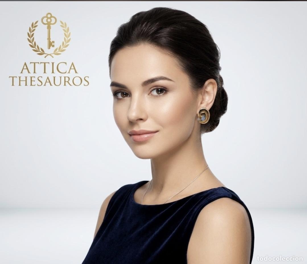 Joyeria: Elegantes pendientes antiguos de dise&ntilde;o remolino en plata 925 chapados en oro con aguamarinas.