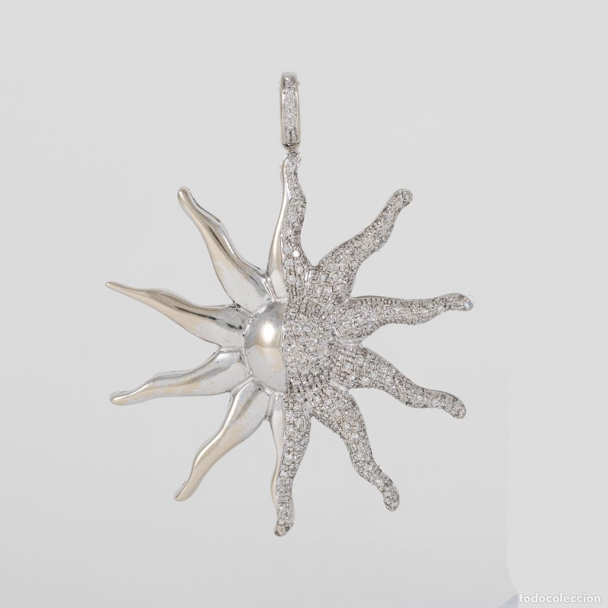 Joyeria: Colgante Sol de oro blanco 18k con brillantes