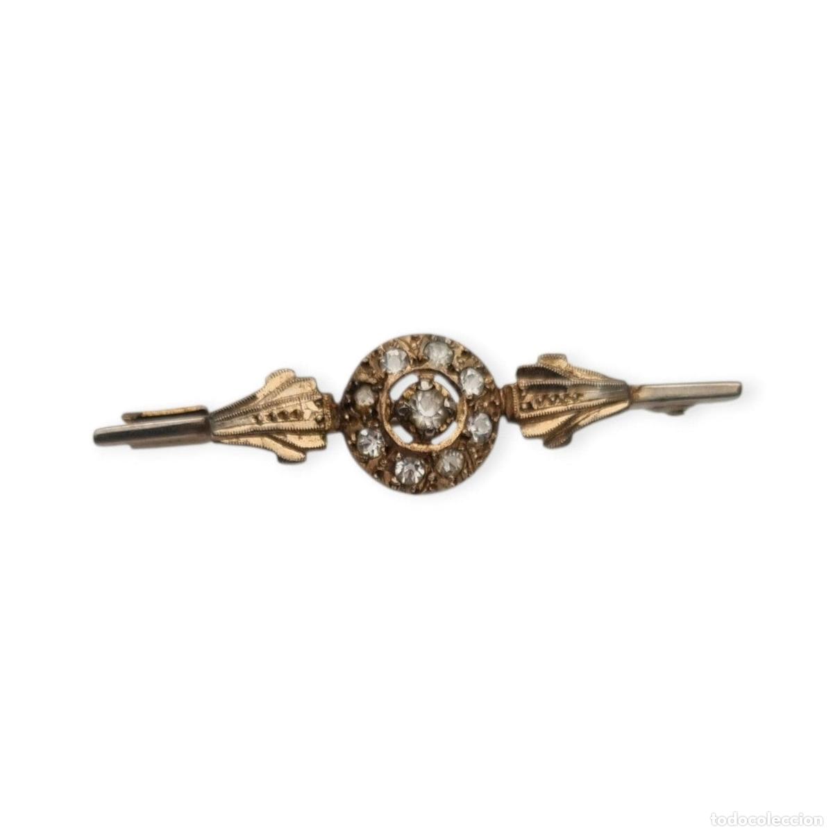 Joyeria: Broche antiguo Belle &Eacute;poque en metal dorado con pedrer&iacute;a transparente, Europa, ca. 1890&ndash;1920