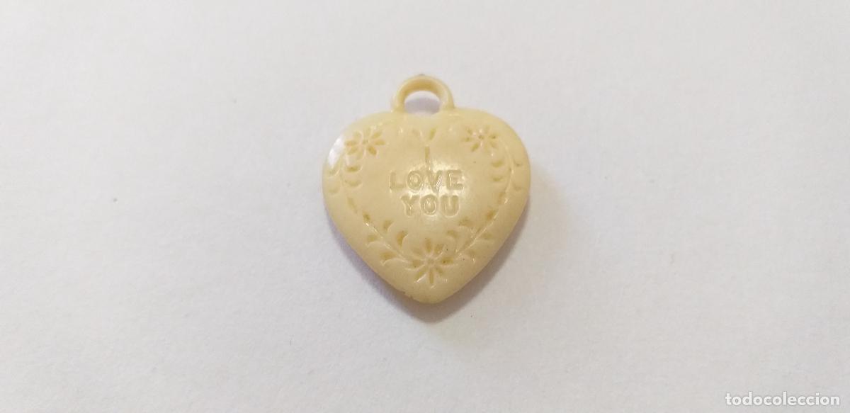 Joyeria: Colgante forma de coraz&oacute;n. Letras de I love you