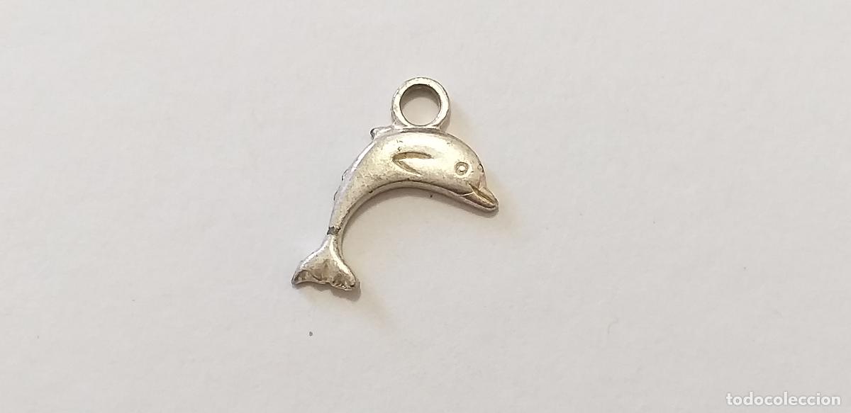 Joyeria: Peque&ntilde;o colgante en forma de delf&iacute;n. Pez. Miniatura