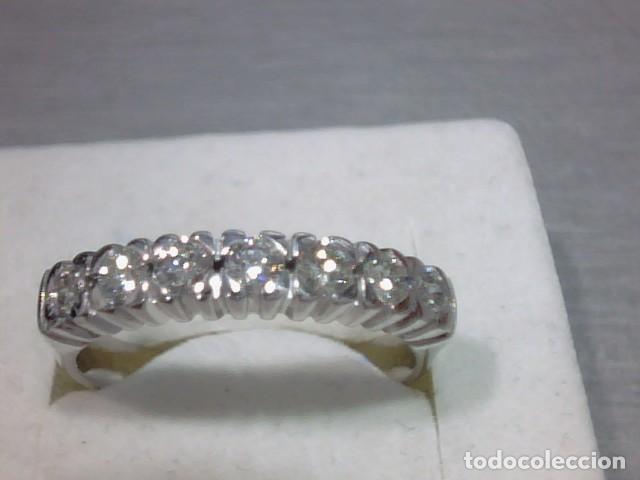 Joyeria: anillo en oro 18 kts con diamantes