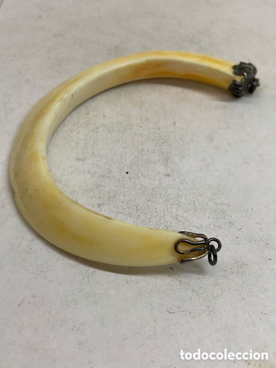 Joyeria: Colgante de plata hueso C678