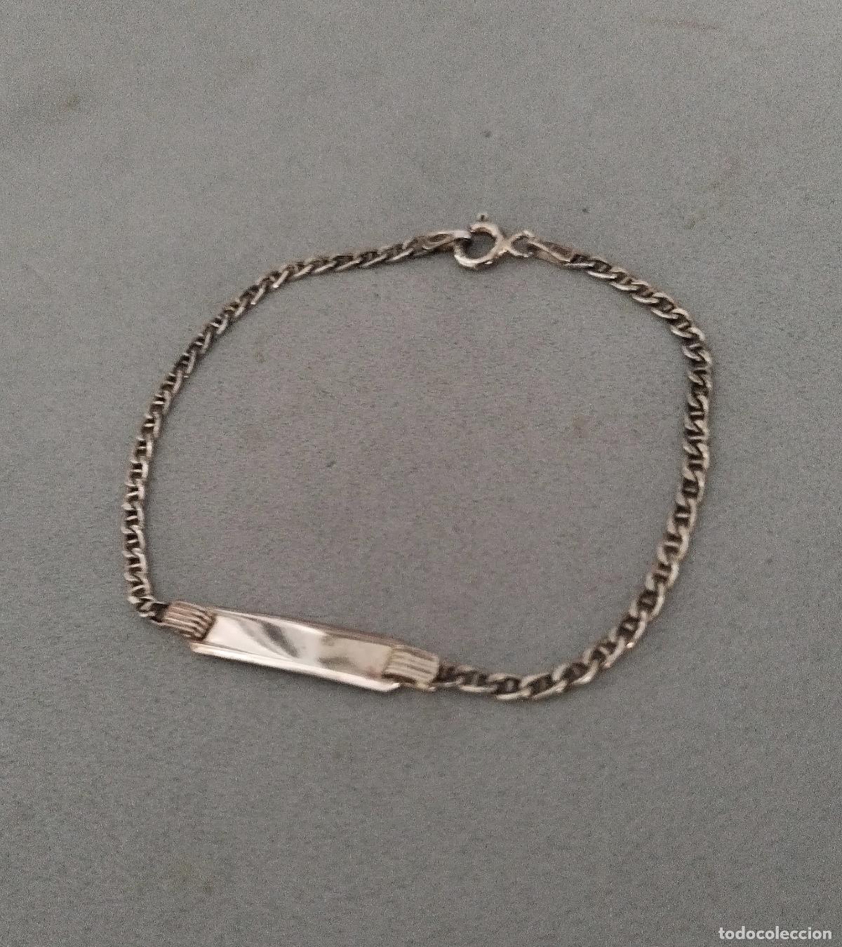 Joyeria: Pulsera esclava, plata de ley con sus contrastes.