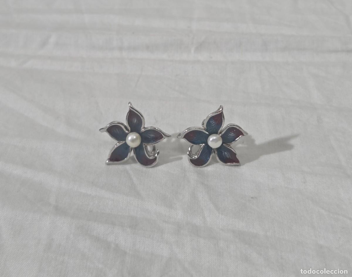 Joyeria: Pendientes en forma de flor de plata 925