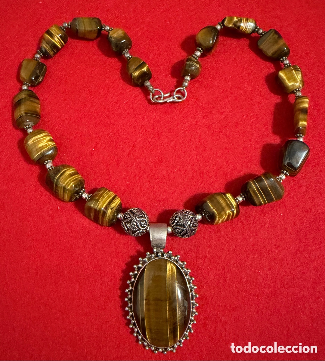 Joyeria: Bell&iacute;simo Collar en plata de ley contrastada y piedras de ojo de tigre.