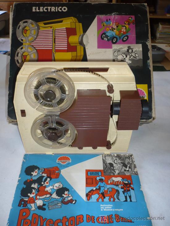 Juegos antiguos: PROYECTOR DE CINE NACORAL 8m/m. - Foto 1
