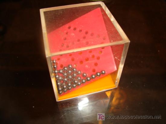 Juegos antiguos: juego cubo con rulos de acero - Foto 1