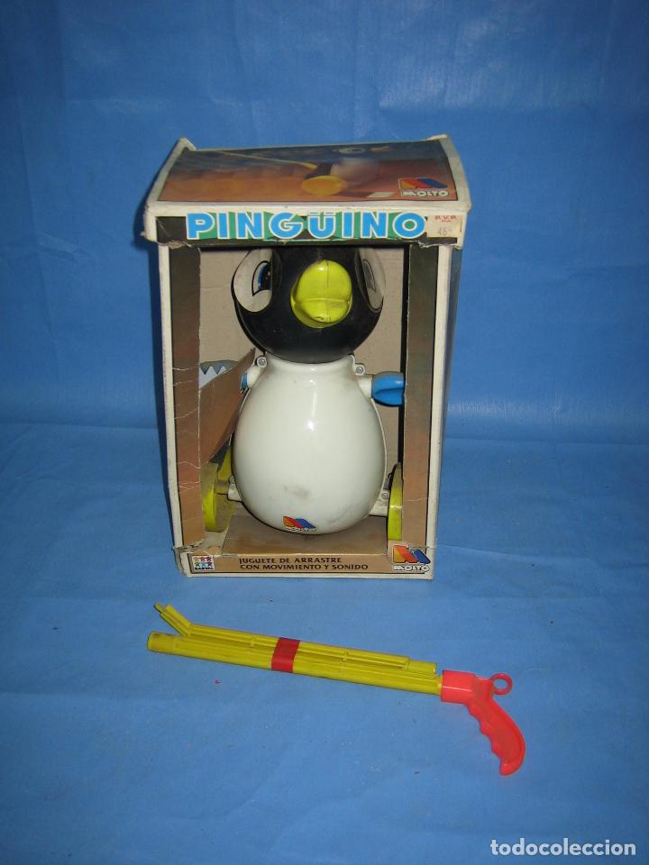Juegos antiguos: 12 ping&uuml;ino de juguete de Molto - Foto 1