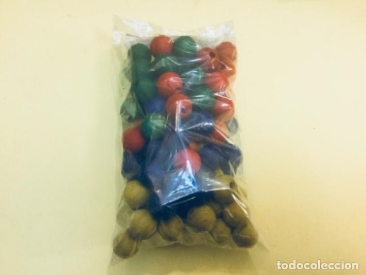 Juegos antiguos: Bolsa con 100 bolas madera. &Oslash; 1,6 cms - Foto 1