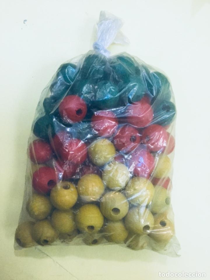 Juegos antiguos: Bolsa con 100 bolas madera. &Oslash; 2 cms - Foto 1