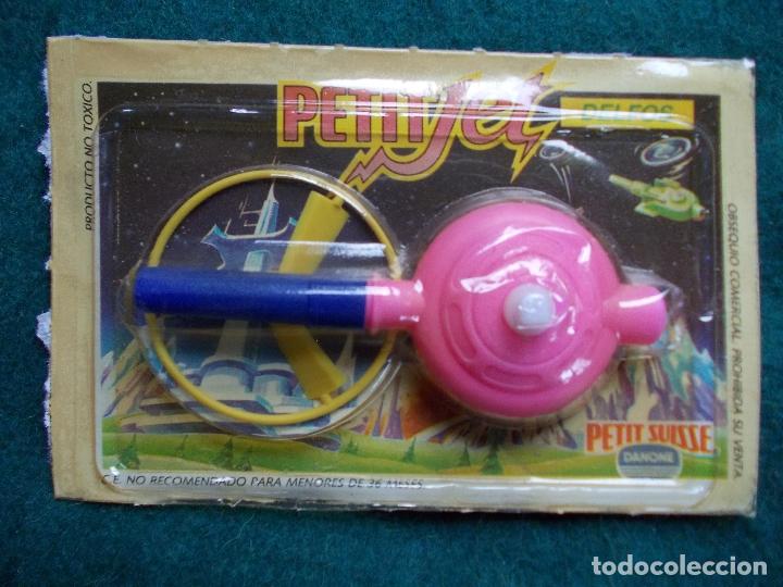 Juegos antiguos: Petit Jet Danone Delfos - Foto 1
