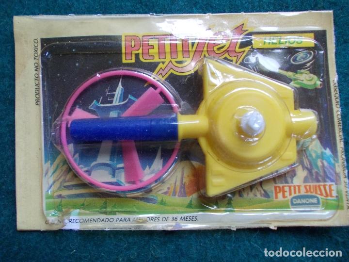 Juegos antiguos: Petit Jet Danone helios - Foto 1
