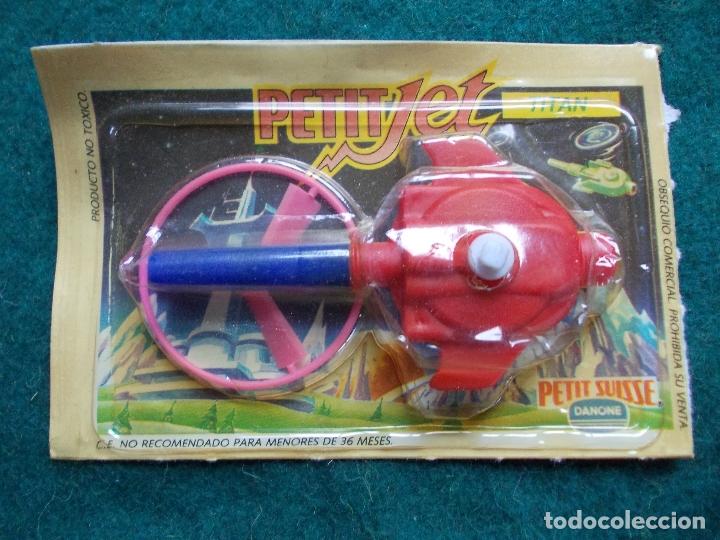 Juegos antiguos: Petit Jet Danone titan - Foto 1