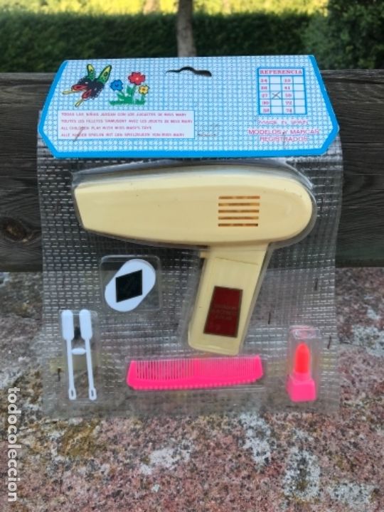 Juegos antiguos: Juguete, secador - Foto 1