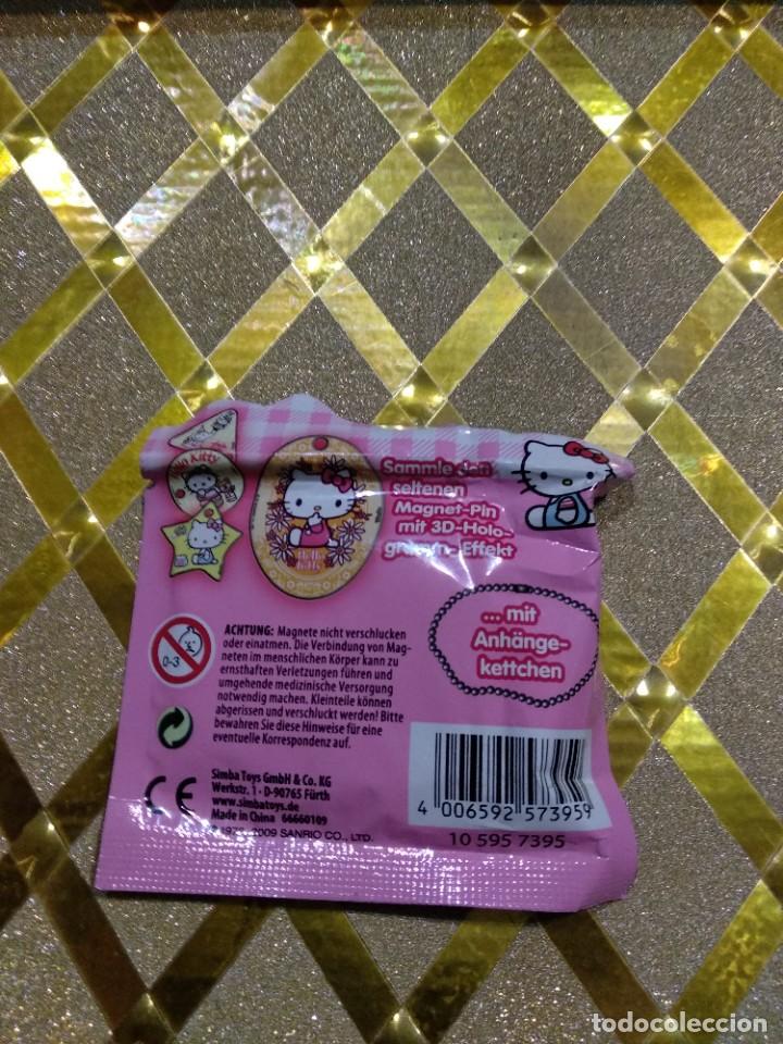 Juegos antiguos: Im&aacute;n y pulsera de Hello Kitty * - Foto 2