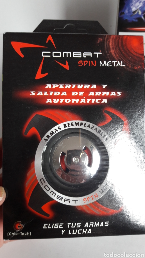 Juegos antiguos: 2 peonzas Combat spin metal - Foto 2