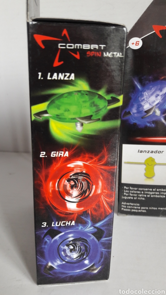 Juegos antiguos: 2 peonzas Combat spin metal - Foto 3