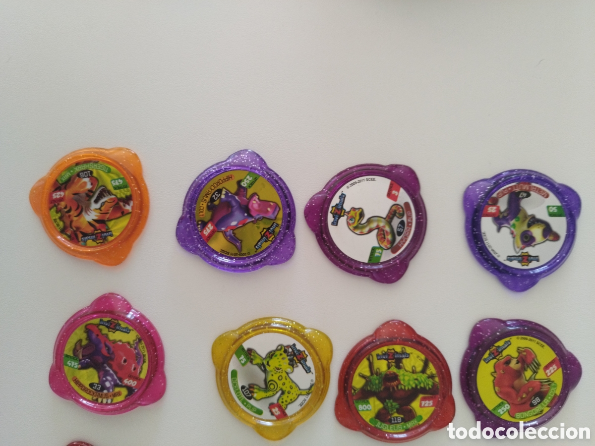Juegos antiguos: Lote 16 tazos invizimals - Foto 2