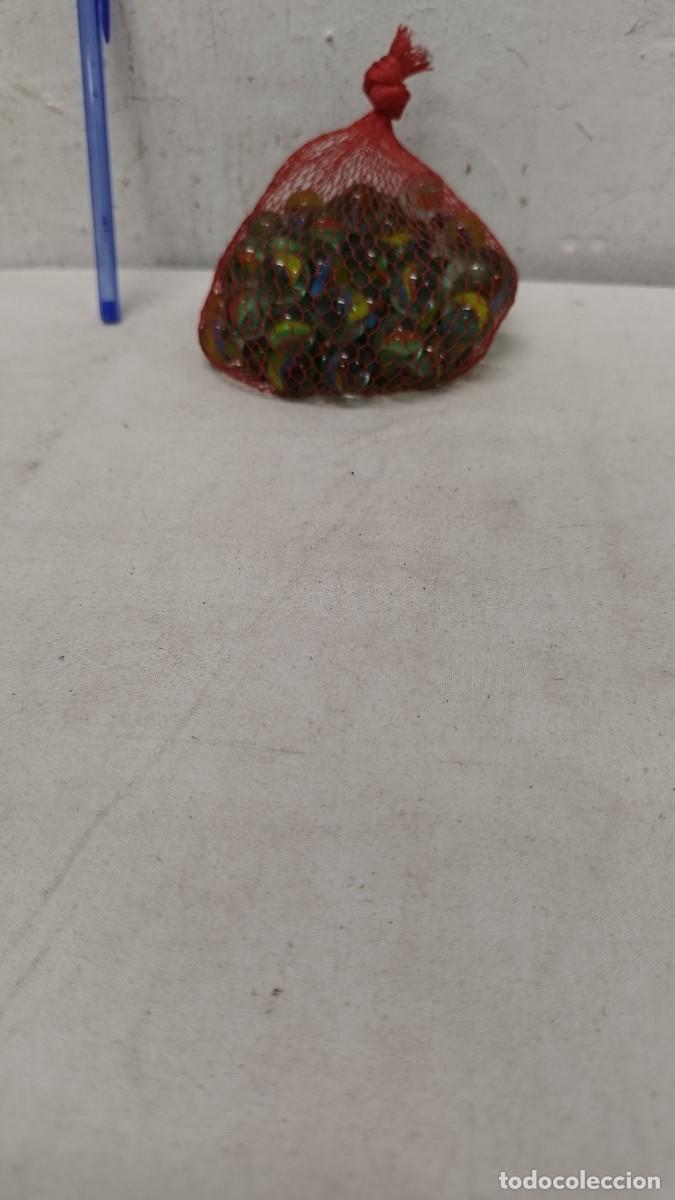 Juegos antiguos: Antigua bolsa,maya de canicas de cristal - Foto 1