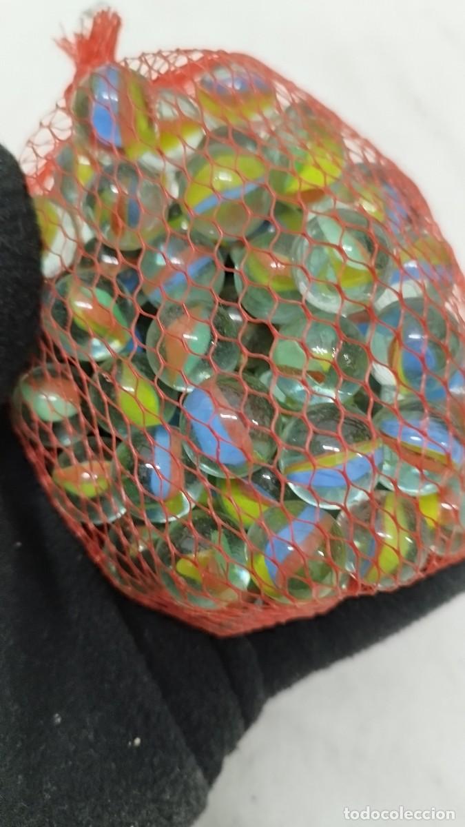 Juegos antiguos: Antigua bolsa,maya de canicas de cristal - Foto 4