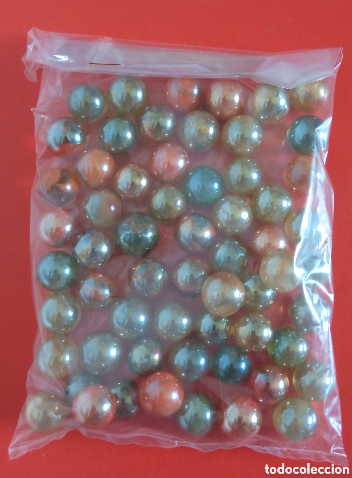 Juegos antiguos: 60 CANICAS TORNASOL 70S.NUEVAS. - Foto 1