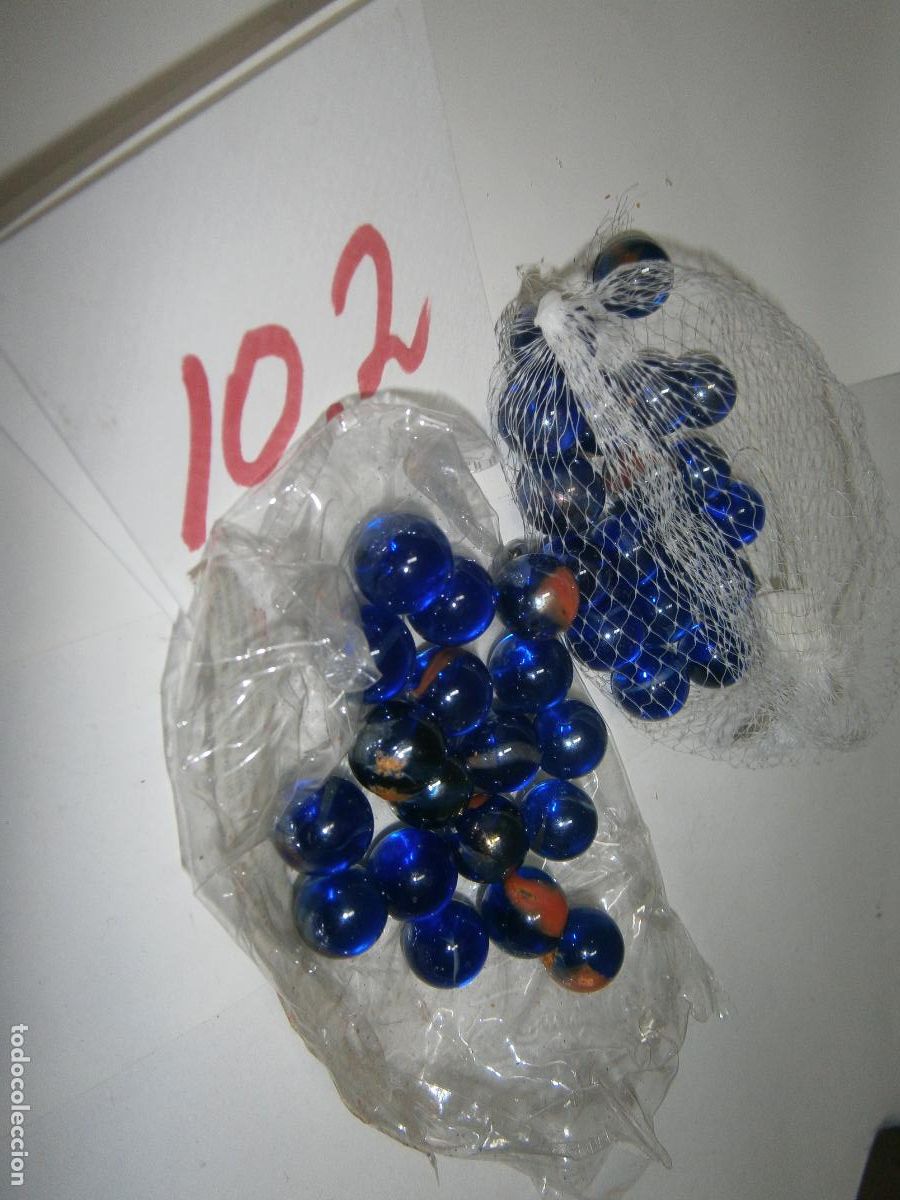 Juegos antiguos: LOTE DE BOLICHES O CANICAS AZULES - Foto 1