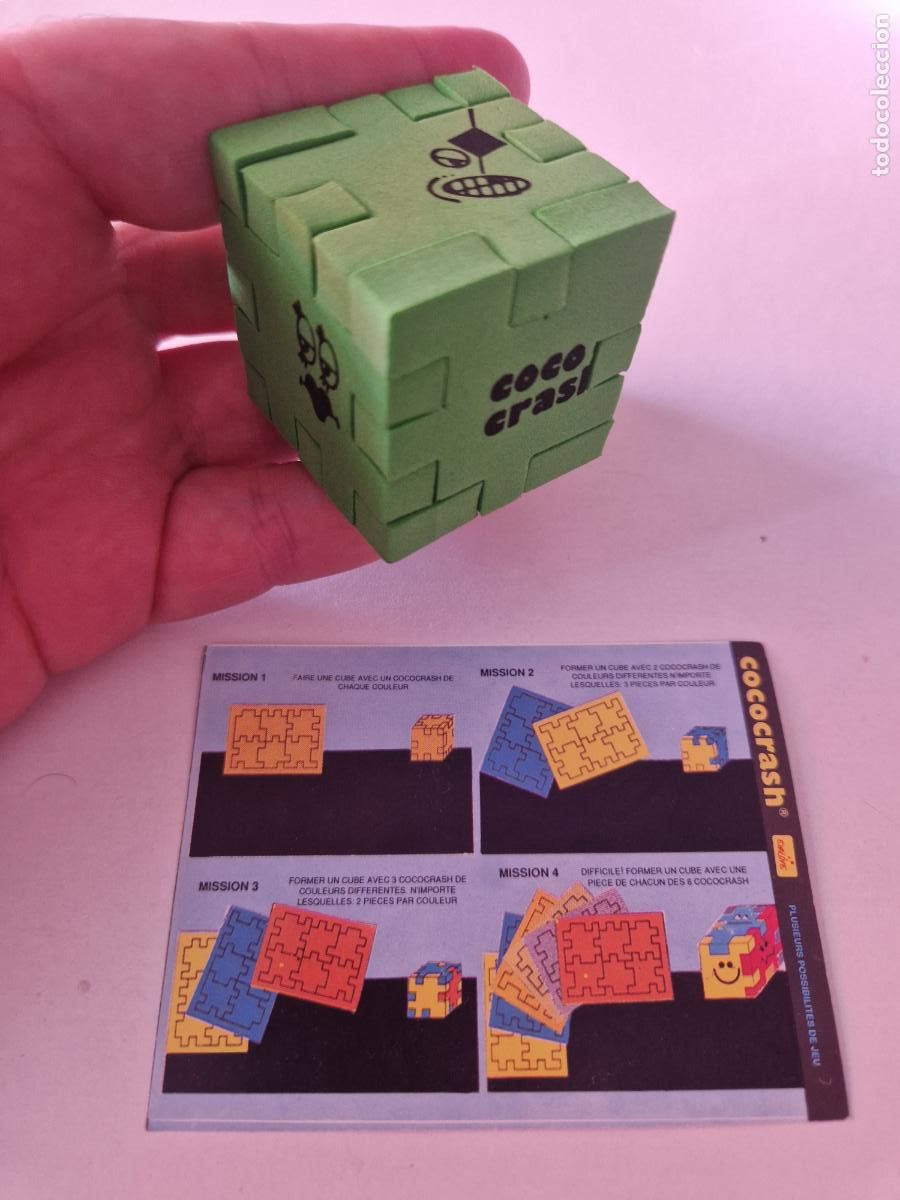 Juegos antiguos: ANTIGUO JUEGO COCO CRASH PUZZLE GOMA VERDE EVALAND ROMPECABEZAS CUBO RUBIK JUGUETE COCOCRASH
