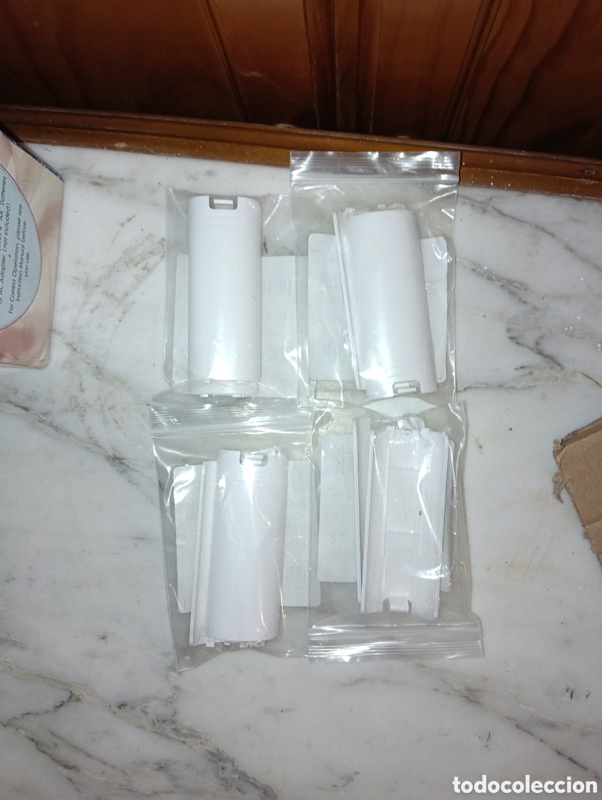 Juegos antiguos: 8 tapas trasera de mando de wii de Nintendo