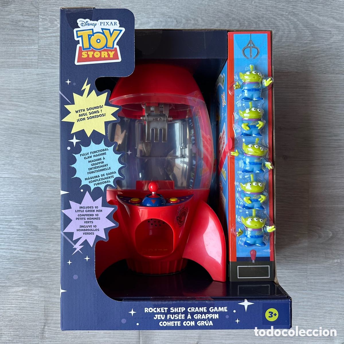 Juegos antiguos: M&aacute;quina de gancho de alien&iacute;genas con sonido, Toy Story, Disney Store.
