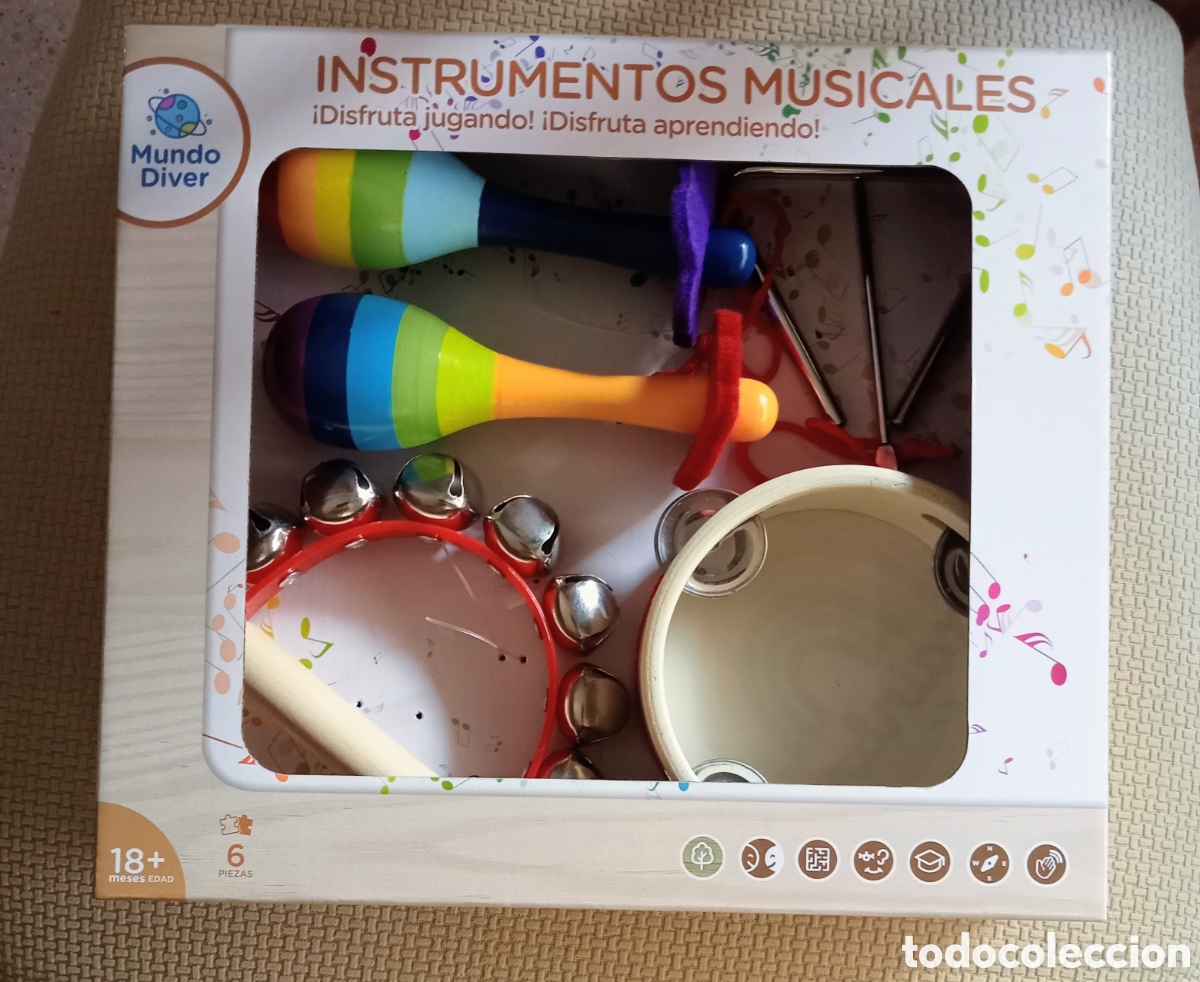 Antike Spiele: Juego de instrumentos infantiles musicales.