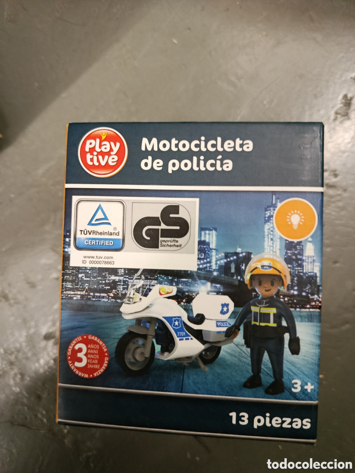 Antike Spiele: Motocicleta de polic&iacute;a y figura