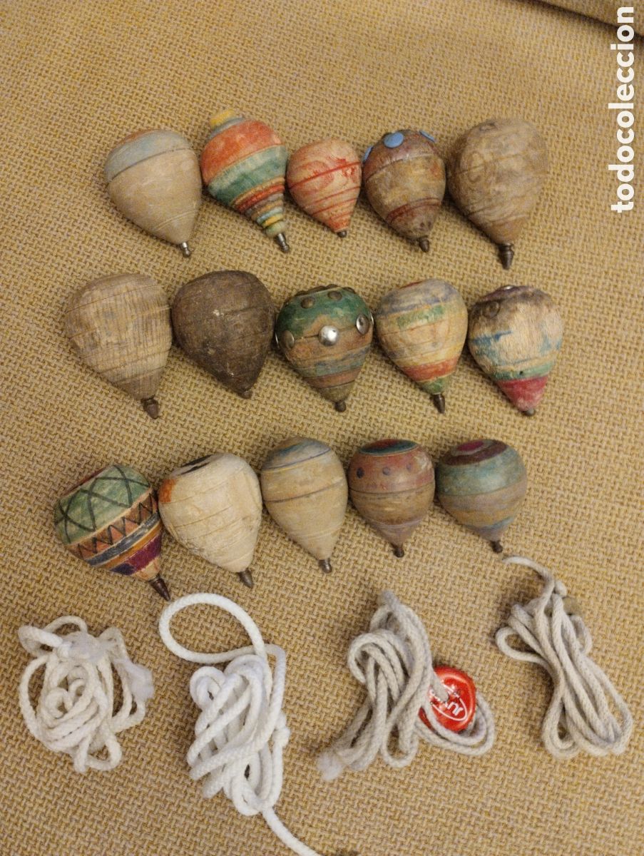 Juegos antiguos: Lata de peonzas antiguas - Foto 2