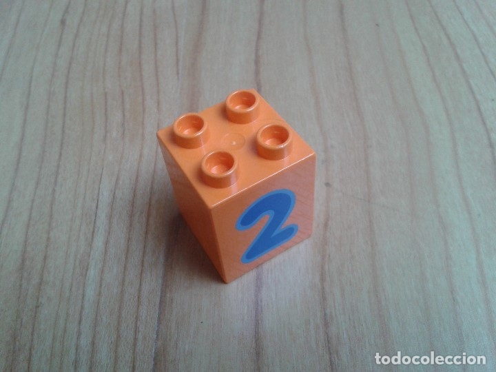 Juegos construcci&oacute;n - LEGO: Lego Duplo -- pieza componente -- n&ordm; 2 -- Rectangular -- Naranja -- Formas, colores, n&uacute;meros - Foto 2
