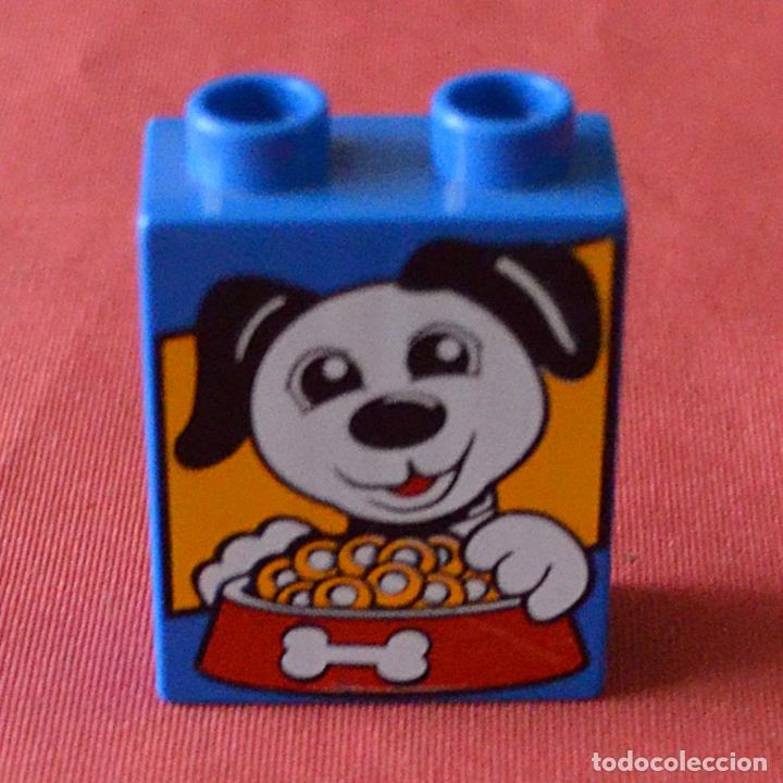 Juegos construcci&oacute;n - LEGO: PIEZA LEGO - PERRO CON COMIDA - Foto 1