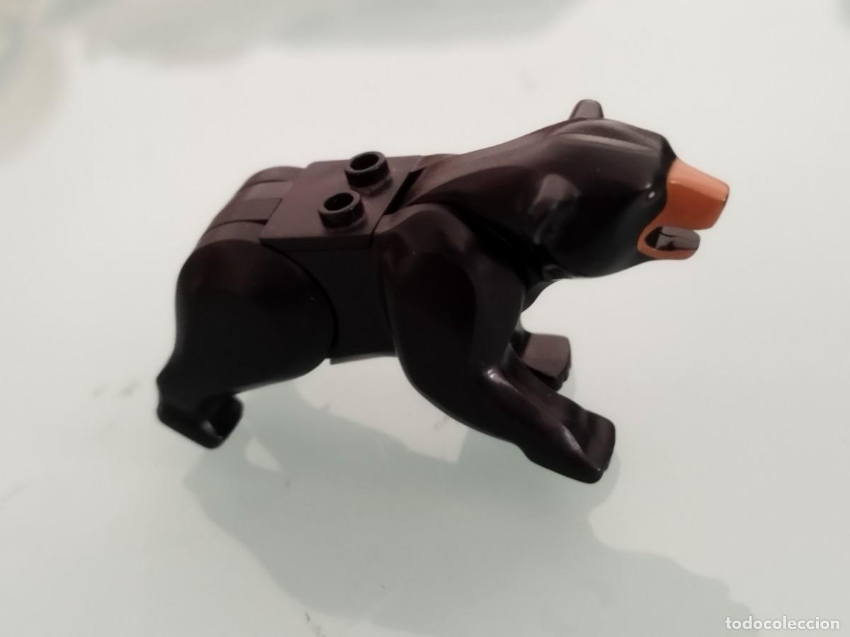 Juegos construcci&oacute;n - LEGO: Figura Lego de un oso negro.